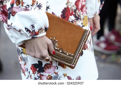 PARIS - SEPTEMBER 30: Woman With Decorated Bag Poses For Photographers Before Yang Li Show, Paris Fashion Week Day 2, Spring / Summer 2016 Street Style On September 30, 2015 In Paris.