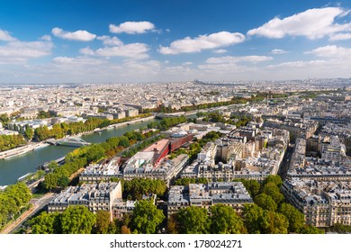 Paris Skyline, France. Panoramic View Of Paris From The Eiffel Tower. Beautiful Cityscape Of Paris On A Sunny Day. Scenic Panorama Of The Paris City With The River Seine In Summer. 