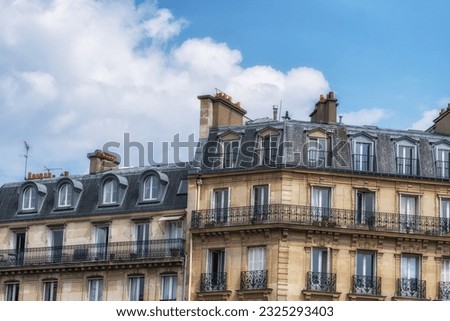 Paris style apartment with balconies and windows. Taken near Notre Dame Cathedral in Paris, France