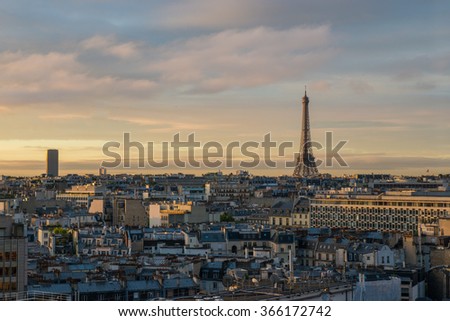 Similar – View of Paris with Eiffel tower silhouette at sunset