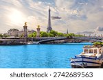 Paris sunset view with Eiffel Tower and Alexandre III Bridge over river Seine, France