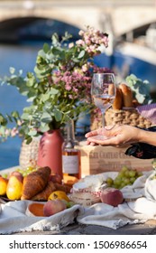 Paris/France - September 8 2019: Romantic Picnic For Two On The Quay Of Seine River In Paris. Parisien Elegancy And Chic. Traditional French Croissants, Cheese, Fruits And French Wine. 