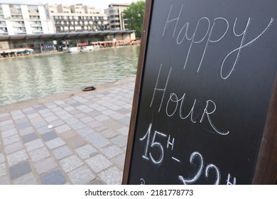 Parisian Cafe Terrace On Canal Riverbank