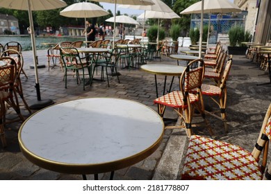 Parisian Cafe Terrace On Canal Riverbank