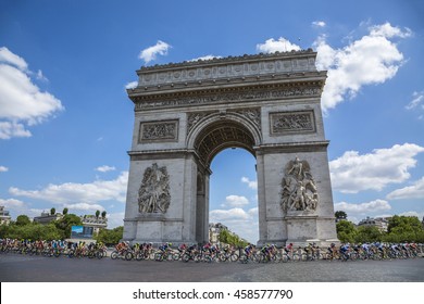 PARIS-JUL 24: The feminine peloton riding by the Arch de Triomphe on Champs Elysees in Paris during the second edition of La Course by Le Tour de France 2016.