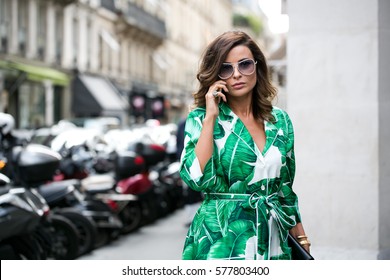 PARIS-JULY 6, 2016. Stylish Woman Is Going To Elie Saab Fashion Show. Haute Couture. Paris Fashion Week.