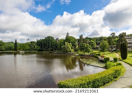 Park around the lake of Bagnoles-de-l'Orne on a sunny day