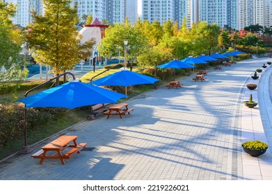 Park Benches And Awnings. Park Shade Umbrella.