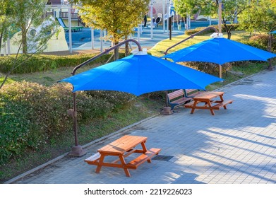 Park Benches And Awnings. Park Shade Umbrella.