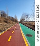 A park bike path and a human access road formed along Tancheon Stream, one of the tributaries of the Han River