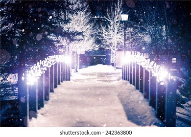 Park Bridge Holiday Illumination In Winter Season. Estes Park, Colorado.