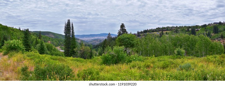 Park City, Empress Pass Views Of Panoramic Landscape Along The Wasatch Front Rocky Mountains, Summer Forests And Cloudscape. Utah, United States.