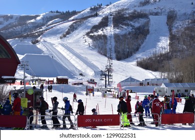 Park City, Utah / U.S.A. - January 27th 2019: Park City Ski Resort On A Sunny Sunday View Of Ski Lift And Skiing Terrain On Mountainside.