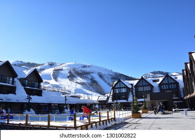 Park City, Utah / U.S.A. - January 27th 2019: Ice Rink And Park City Mountain Ski Resort With Chalets In View.