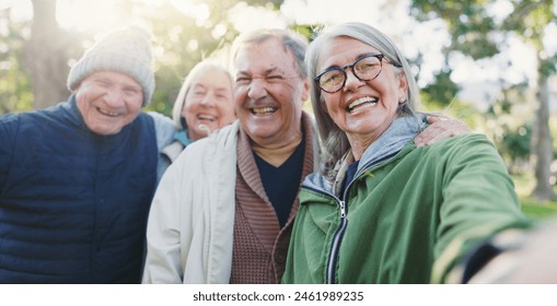 Park selfie, face and senior happy friends bonding, support and smile for reunion memory photo of old woman, man or club. Happiness, portrait photography or elderly group for winter profile picture - Powered by Shutterstock