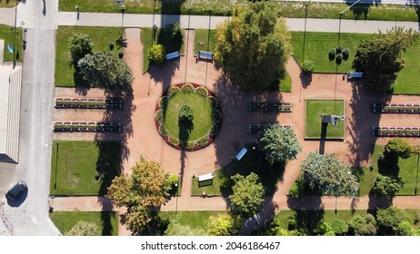 Park View From The Sky. Drone Footage. Drone Picture And Video Of The Park. Flower Beds And Trees In The Park
