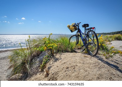 Parked Bicycle With Basket On Beach Bike Path