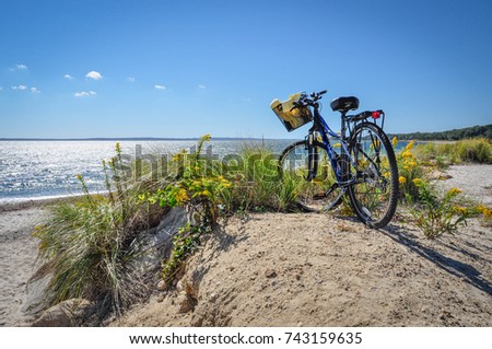 Parked Bicycle With Basket On Beach Bike Path