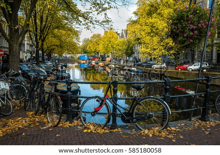 Similar – Foto Bild Architektur niederländischer Häuser Fassade und Hausboote am Amsterdamer Kanal