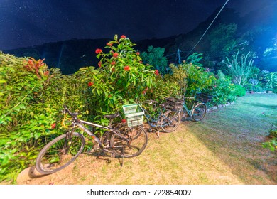 Parked Bikes At Night In La Digue - Seychelels.