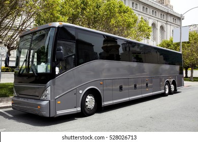 Parked black tour / charter bus in San Francisco. Horizontal. 
