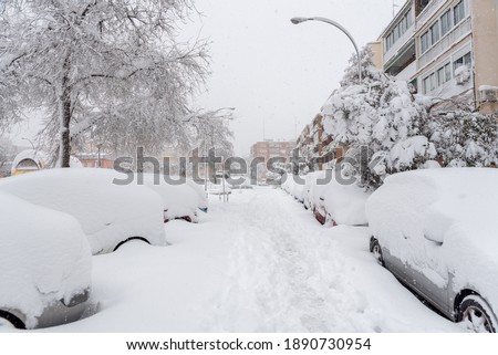 Similar – Image, Stock Photo Heavy snowfall and a smoking chimney