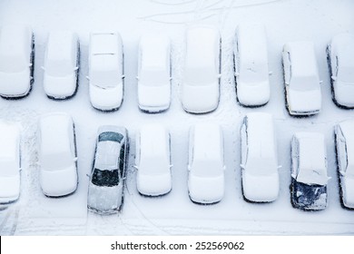 Parked Cars Covered In Snow Shot From Above