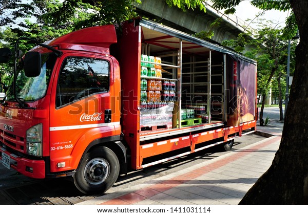 Parked\
Freight car for delivery goods to customers  at Phahonyothin Road,\
Chatuchak, Bangkok, Thailand on May 28,\
2019