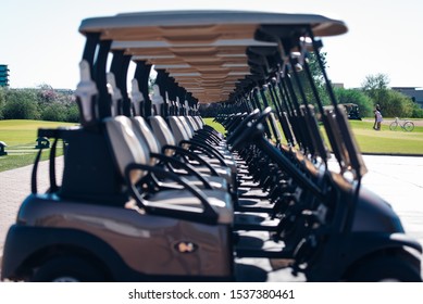 Parked Golf Carts At The Golf Course