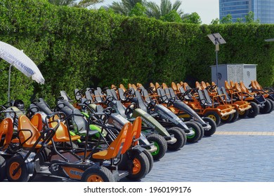 Parked Rugged Go Karts With Off Road Tires Are Lined Up Ready To Race. Rental Go Kart For Children To Adults On Outdoor Venue With Long Track On Corniche Road, Abu Dhabi, UAE,Feb.2021.