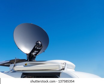 Parked Satellite TV Van Transmits Breaking News Events To Orbiting Satellites For Broadcast Around The World 