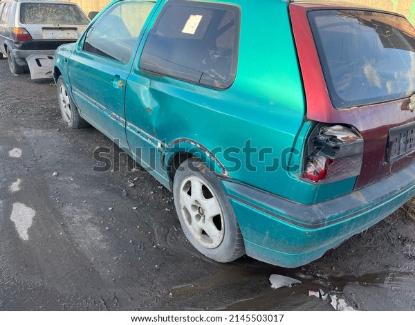 Parked smashed car, crushed\
car