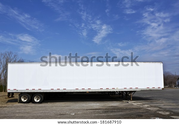 Parked trailer ready for pick\
up.