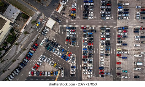 Parking. Aerial View Of Cars Parked In Line In A Parking Lot. Colored Cars. Drone View