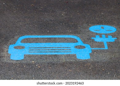 Parking Area, Cornwall, UK, July 25th, 2021. Electric Car Charging Zone Road Marking.