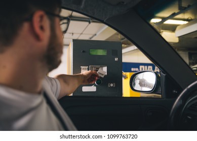 Parking Barrier. Man Taking Ticket To Pass Control On Parking Area