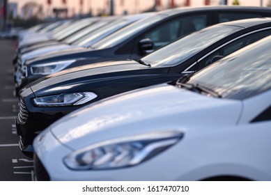 Parking car dealership  with luxury models in row - Powered by Shutterstock