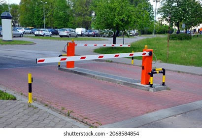 Parking Lot Cars Behind The Boom Barrier