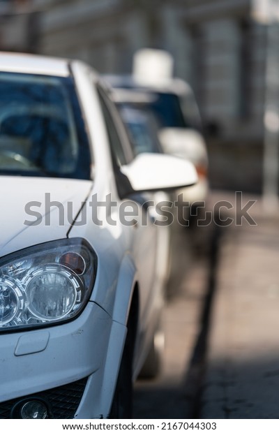 parking cars on the\
street with sunshine