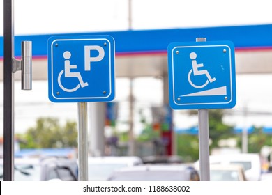 Parking for disabled guests label in gas station.