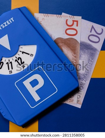 A parking disc, permit, or ticket for measuring time and paying municipal services. A parking disc as a background for your design
