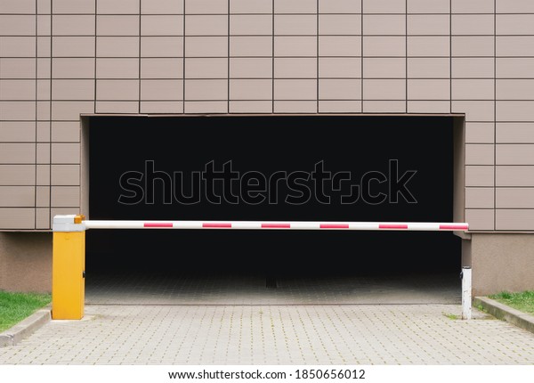 Parking entrance with car park barrier and\
automatic car entry\
system