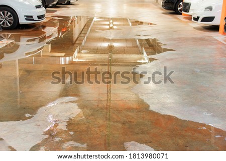 Parking flooded with water due to external leaks