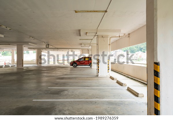 Parking garage\
department store interior Empty parking lot or garage interior\
Business building\
office