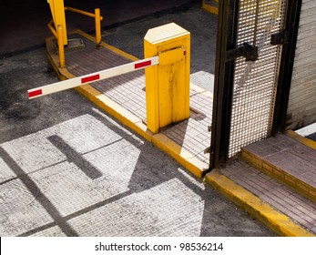 Parking Garage Entrance . Barrier Closed To Vehicles. Copyspace.
