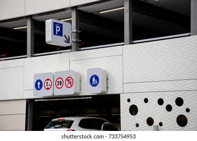 Parking Garage Entrance With Signs