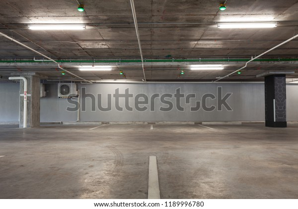 Parking garage interior,
industrial building,Empty underground interior in apartment or in
supermarket.