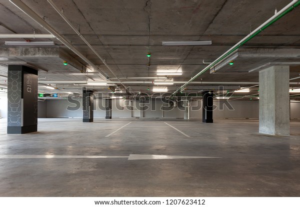 Parking garage interior,
industrial building,Empty underground interior in apartment or in
supermarket.