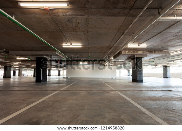 Parking garage interior,\
industrial building,Empty underground interior in apartment or in\
supermarket.