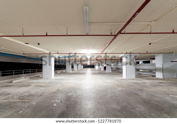 Parking garage interior,\
industrial building,Empty underground interior in apartment or in\
supermarket